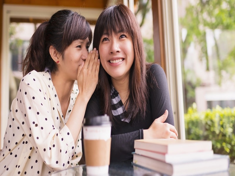 girls gossiping plate full of delight