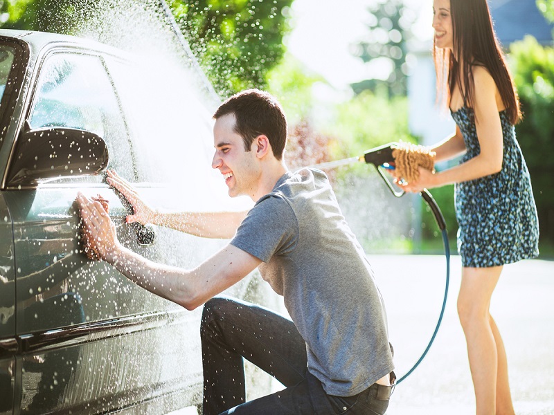 couple doing house hold chores together 